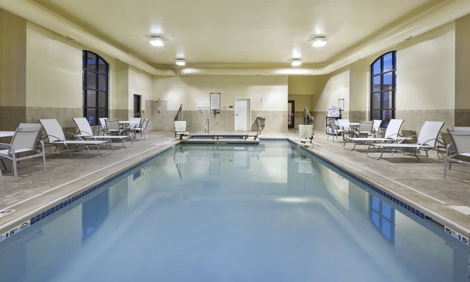Okemos Condo | Free Breakfast Buffet. Near Michigan State University.