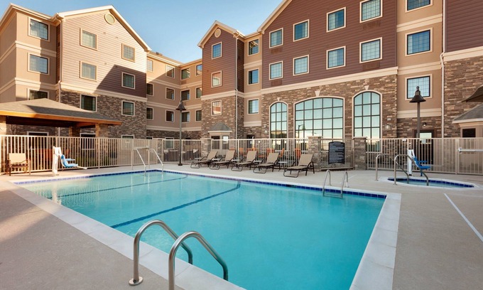 Midland Condo | Free Breakfast. Pool. King Suite. Close to the new Chevron and Oxy campuses!