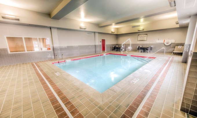 Clintonville Apartment | Free Breakfast! Suite Only 1 Mile from OSU! Indoor Pool!