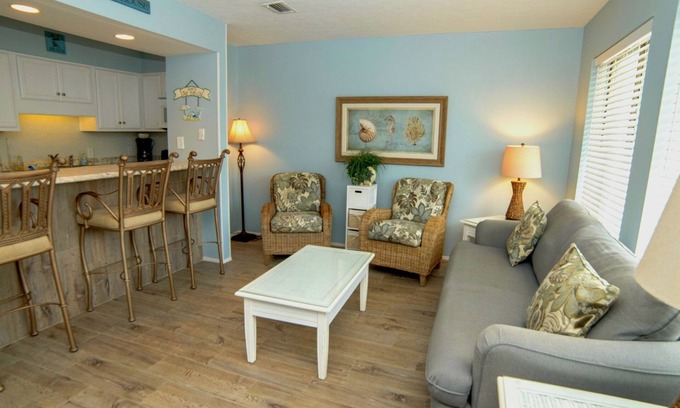 Thomas Drive Condo | Freshly updated beachfront condo with stunning views. Sleeps 4. Onsite Pool.
