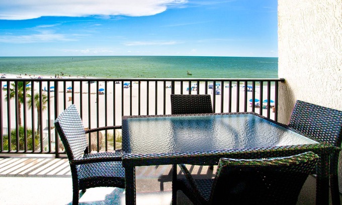 Madeira Beach Condo | Front Row Seat to World Class Sunsets. Beachfront and Across from Johns Pass Village.