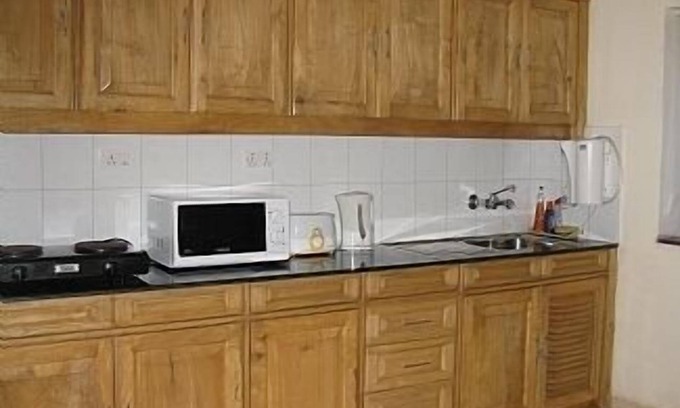 Candolim Apartment | Furnished Apartment In Regal Park With Serene Pool And Garden Views