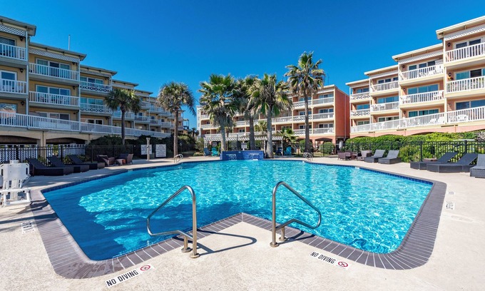 Galveston Condo | Galveston condo on Seawall near beach, gulf view, pools, WiFi, fitness room.
