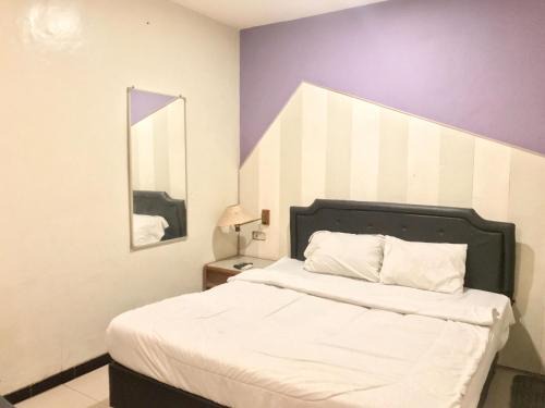 Surabaya Hotel | Gangnam Style Residence Mitra RedDoorz near MERR Surabaya