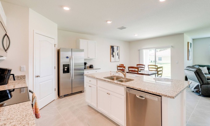 Fedhaven Cottage | Gated Community < 30 Mi to Disney: Poinciana Home!