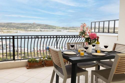 Għadira Apartment | Ghadirabay Seafront With Sea Views By Homely
