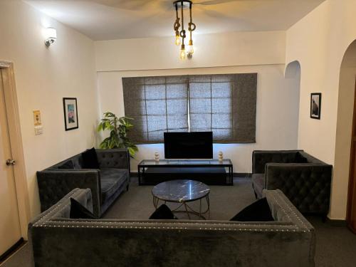 D.H.A. Apartment | Ghumo - DHA Near Sea View Serviced Apartments