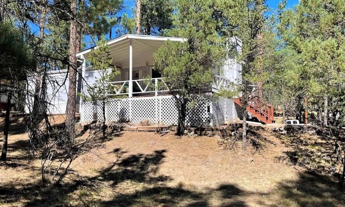 Ruidoso House | Gilia Cabin Summary: