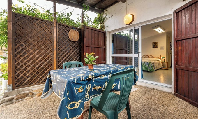 Torre delle Stelle Apartment | Giovanna's Studio Apartment with Shared Garden and Terrace