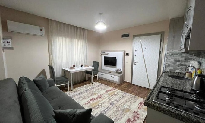 Kultur Mahallesi Apartment | Giriş kat,Merkezi konum, Alışveriş merkezi karşısı'3'