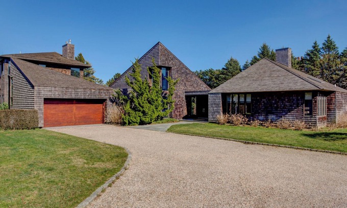 Sagaponack House | Glam-style home with private pool, open-floor plan, floor-to-ceiling.