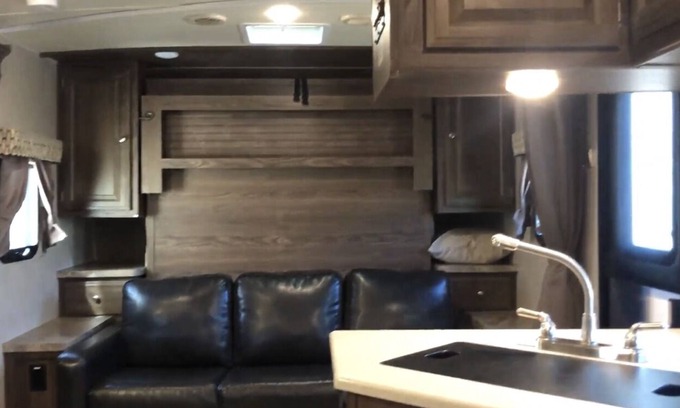 Lafayette House | Glamp in a cozy RV waking up to Nature Trails out your front door.