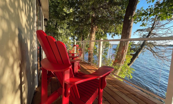 Rideau Lakes Cottage | Glamping anyone? Enjoy picturesque sunsets from your own water’s edge deck!