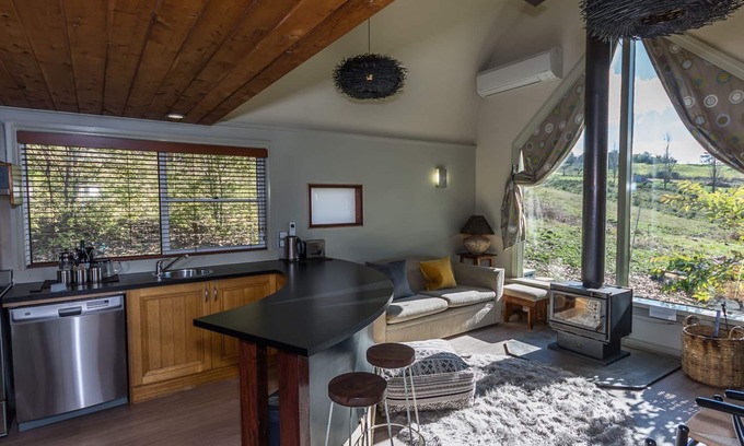 Tawonga South Ski Chalet | Glasshouse with log fire | pool | spa | near Bright | walk to shops restaurants