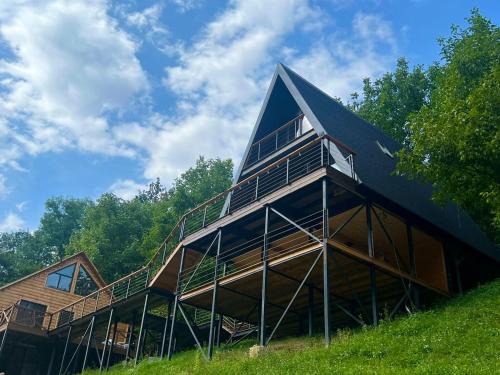 Racha-Lechkhumi and Lower Svaneti House | Glola LakeFront