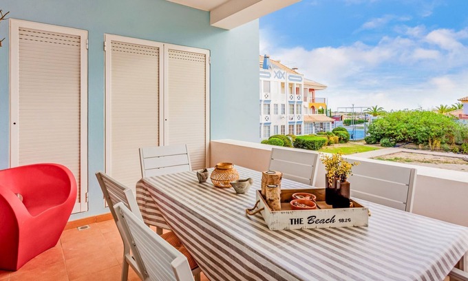 Cabanas Apartment | Golden 1 BDR Flat W/Balcony & Pool by LovelyStay