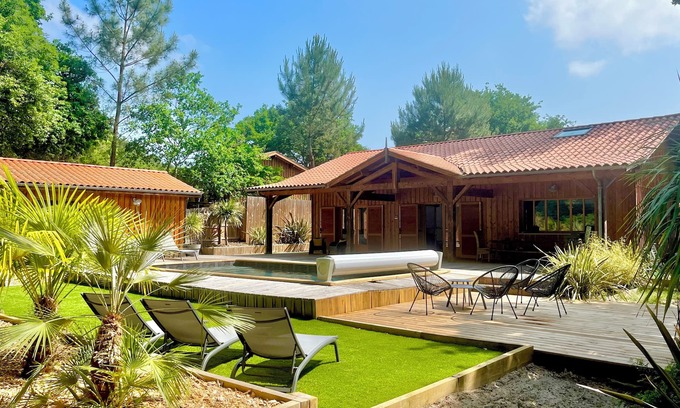 Biscarrosse House | GOLF de Bisca, wooden villa, lake on foot, heated SWIMMING POOL, 4-star rating.