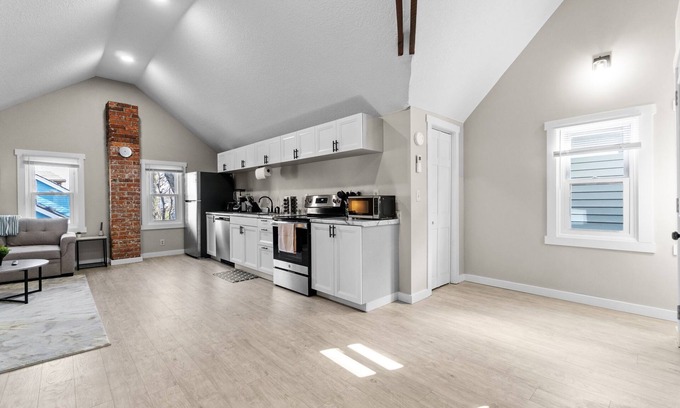 West Central Apartment | Gorg Wooden Beams w/Brick Accents in Downtown Apt