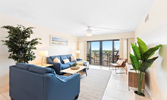 Cocoa Beach Condo | Gorgeous Beach Condo Balcony, Heated Pool, Tennis Court & Family Fun