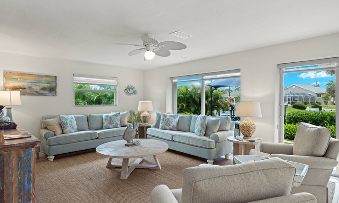Shell Harbor House | Gorgeous canal front home walking distance to the beach!