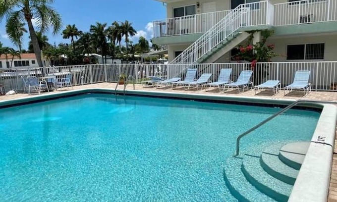 Harbor Village Condo | Gorgeous Florida Waterfront Condo 1st Floor, with Large Heated Pool & Patio