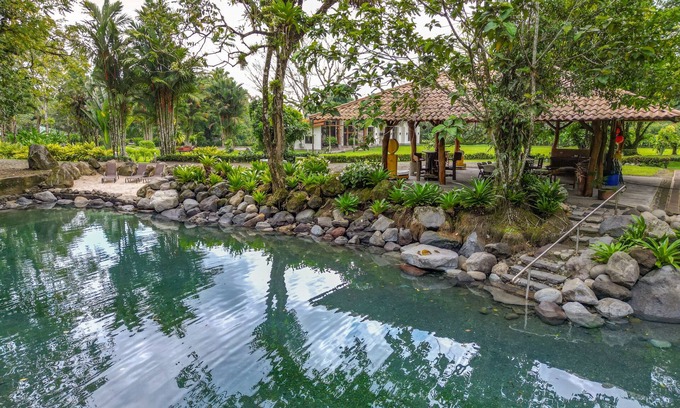 La Fortuna House | Gorgeous home with private artificial lake, fast WiFi, volcano view, & AC