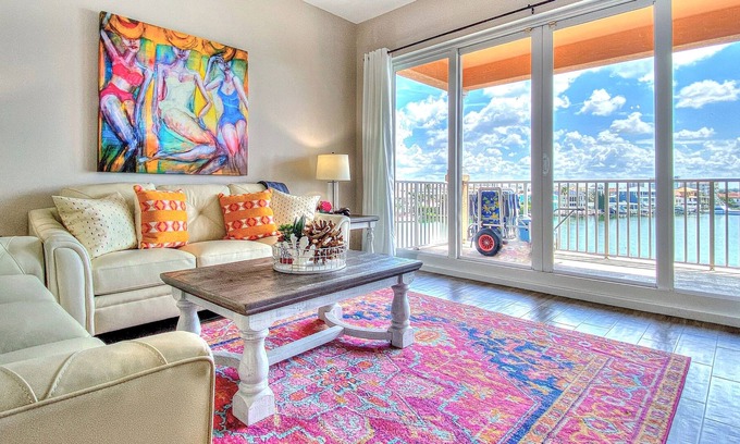 Clearwater Beach Condo | Gorgeous waterfront condo, heated pool/hot tub, walk to beach, dog friendly