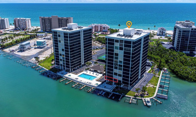 Bonita Springs Condo | Gorgeous water views! Heated Pool,Tennis & Pickleball Across from Bonita Beach!