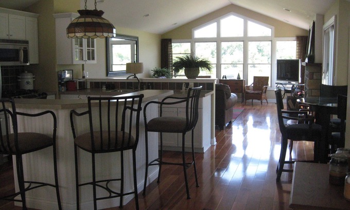 Grand Haven House | Grand River Retreat with Boat Dock
