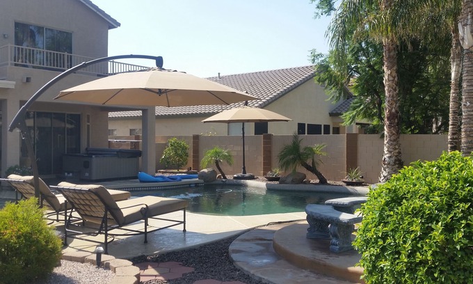Chandler House | Great House with a jacuzzi, pool, outdoor fireplace & a large backyard!