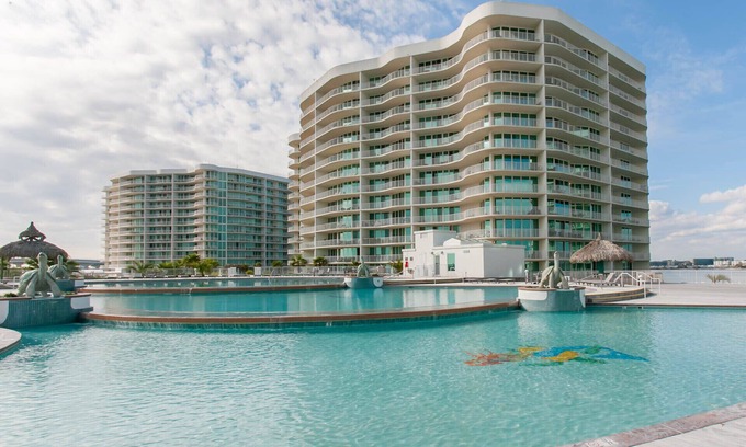 Orange Beach East Condo | Great Views! Spacious 3B/3Ba sleeps 11, Lazy River, Mini Golf, many amenities.