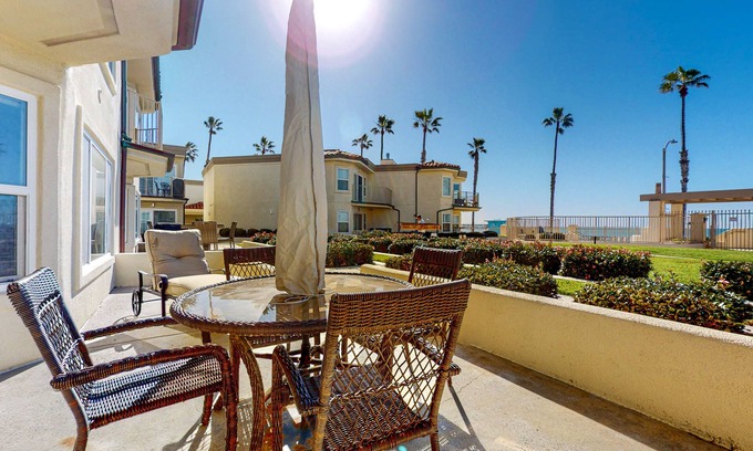 Townsite Condo | Ground-floor condo with ocean views, fireplace, on-site hot tubs & sauna