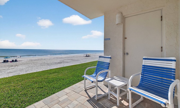 New Smyrna Beach Condo | Ground-floor direct oceanfront condo with a patio and multiple beachfront pools
