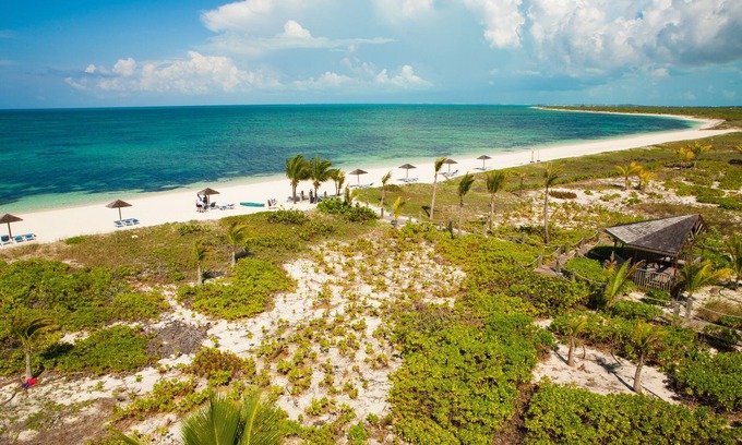 Wheeland Settlement Condo | Ground floor 3 bedroom pool, hot tub private beach wifi sleeps 6