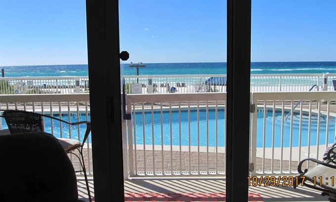 Lower Grand Lagoon Condo | GROUND FLOOR. OPENS UP TO POOL & BEACH. NO WAITING ON ELEVATOR.