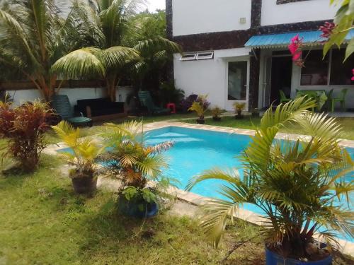 Pointe aux Biches Apartment | Groundfloor Apartment and Firstfloor Apartment with charming pool near sandy beach and commerces nearby