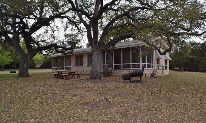 Hunt House | Guadalupe riverfront wooded Hill Country acreage located in Downtown Hunt, TX