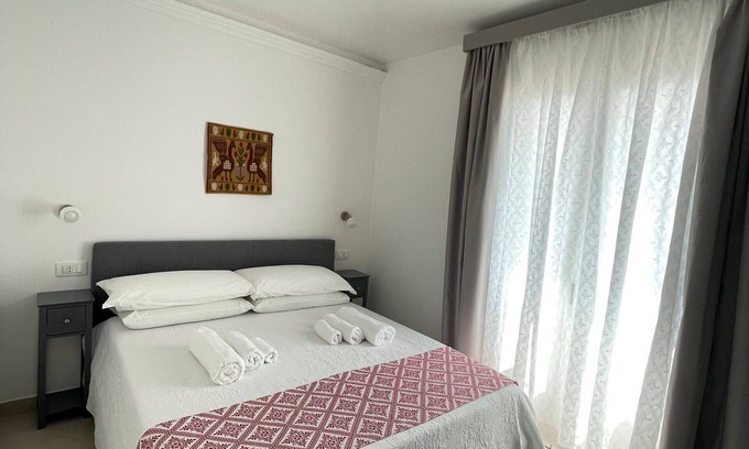 Lotzorai House | Guest House 'Grazia Deledda' with Shared Terrace, Wi-Fi and Air Conditioning