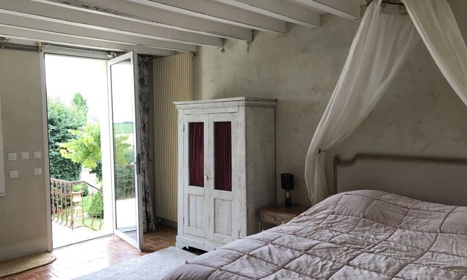 Prunay-Cassereau Bed & Breakfast | Guest room with private exterior access, located on the 1st floor.