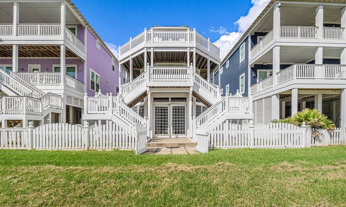 Beachside Village House | Gulf-view home with three balconies - walk to beach - central AC & private W/D