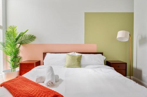 Near West Side Apartment | Gym Garage Parking Balcony Sleeps 6