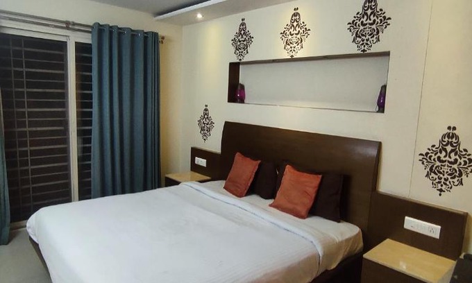 Gokulam Apartment | Happy Vibes studio flats - service apartment