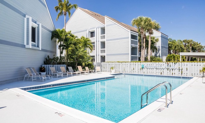 Moorings Condo | Harbor view, sunsets and a short walk to private beach access, we have it all!
