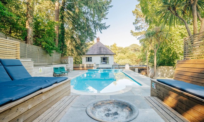 Canford Cliffs House | Harbour Escapes | Prestigious 5 bedroom House with Garden, Pool, Outdoor Kitchen