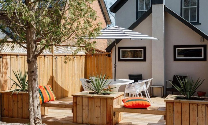 Prince Edward House | Harbour Main playful century home w private patio