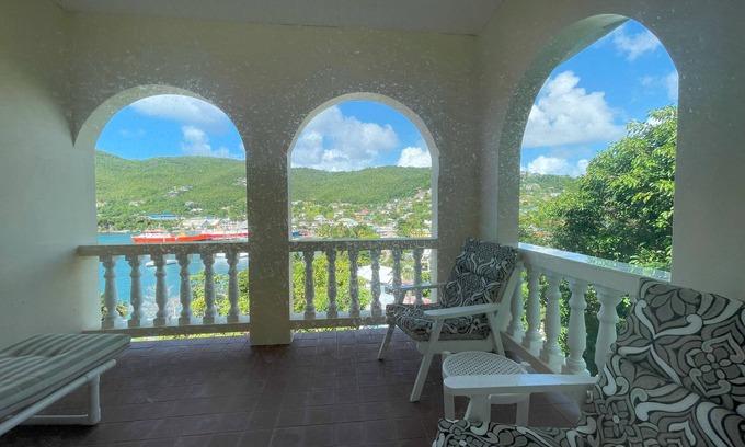 Mount Pleasant Bay Apartment | Harbourview Apartments – Where Breathtaking Views Meet Island Comfort.