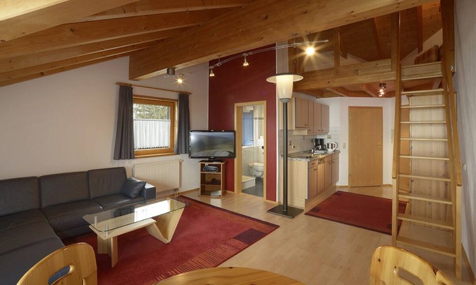 Hopfen am See Condo | Haus Vöhringer - Modern vacation apartment in a top location directly on Lake Hopfensee in the Allgäu