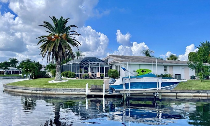 Punta Gorda House | Heated pool, Tropical waterfront home , Dock, Gulf access minutes from downtown.