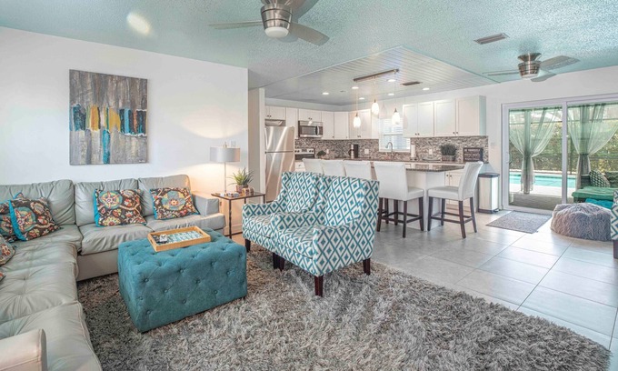 Naples Park House | Heated salted pool, outdoor family room, walk to the beach!