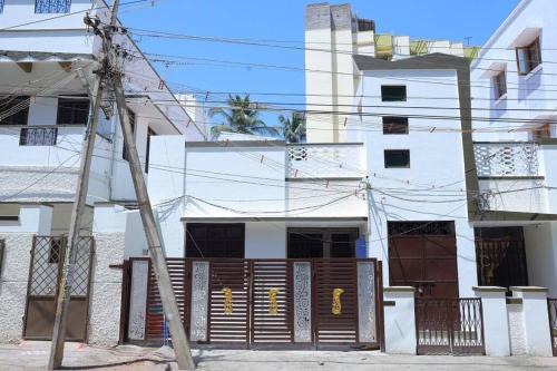 Madurai House | Heritage home with 3 bed/3 bath with kitchen in a residential neighborhood.